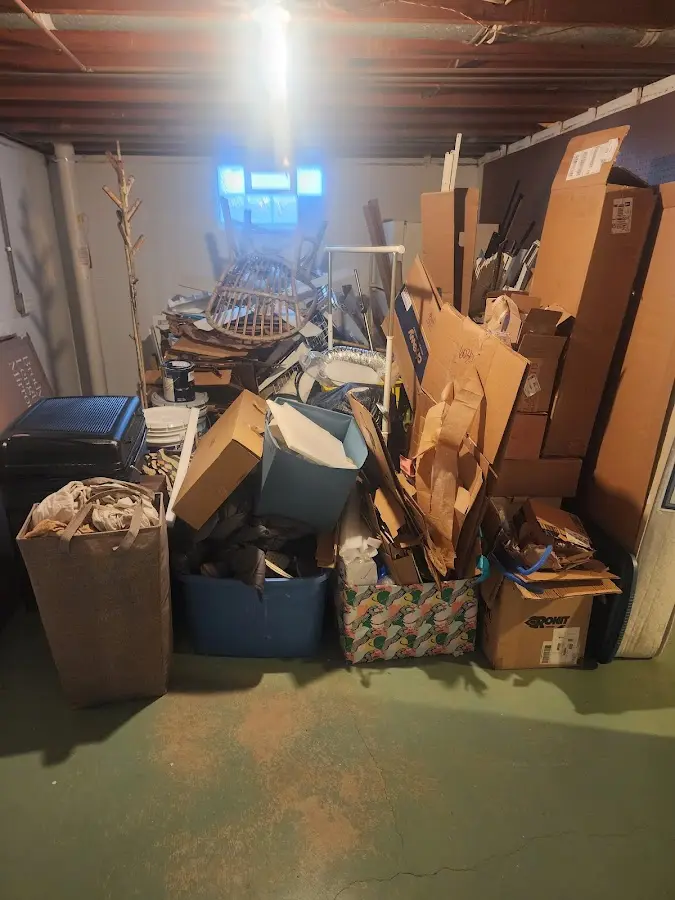 Roll-off dumpster container at job site for 2 Yard Dumpster Rental in Oak Grove